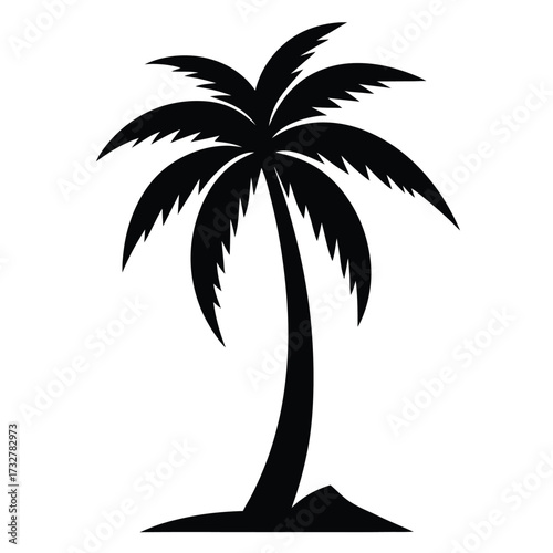 Black tropical palm tree stands alone on a small sandy beach silhouette