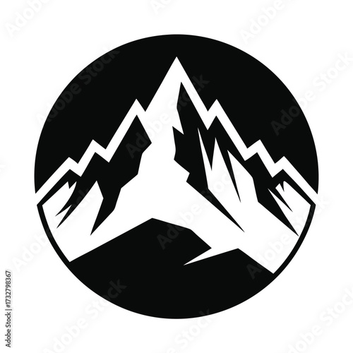 Bold white mountain range peaks within a dark circular frame captures nature's strength