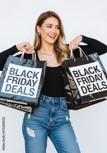 Excited woman smiles carrying Black Friday Deals shopping bags, ready for holiday savings and retail therapy during festive season shopping spree