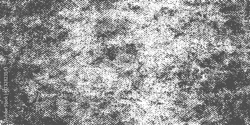 Black and white grunge texture background of a rough stone wall with a seamless gray cement pattern design