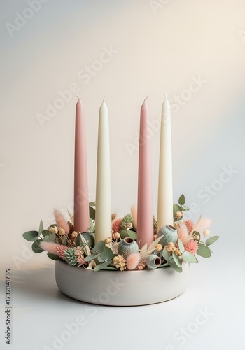 Pastel-toned Advent wreath with candles and natural accents