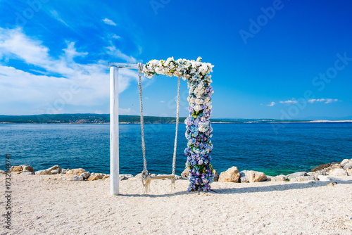 Swing on the beach, Adriatic Sea in the background, tourist attraction, Crikvenica, Croatia