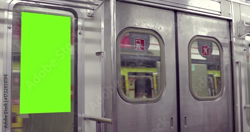 Subway Train Interior with Green Screen Door Advertisement Space.