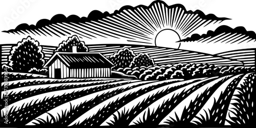Sunrise over farm fields with a house and trees in black and white  
