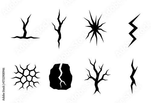 Set of cracked ground elements with abstract silhouette designs