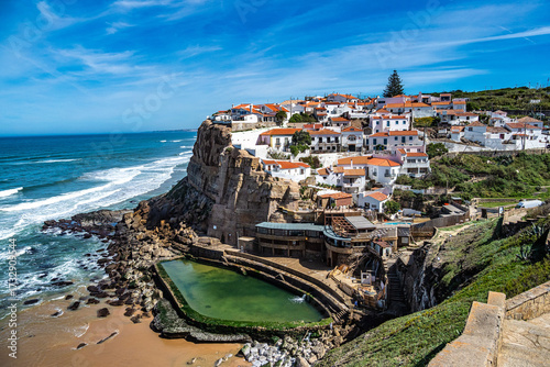 View from the cliffside walking trail of the scenic seaside town of Azenhas do Mar, Portugal