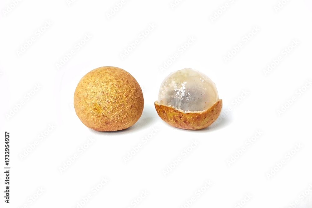Fototapeta premium Fresh longan fruit with pieces of peeled and unpeeled fruit. Isolated on white background with copy space. Tropical Asian fruit. Suitable for editing and used for food and agriculture advertising.