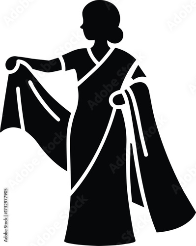 Silhouette of a woman in a traditional indian sari gracefully holding the fabric with one hand