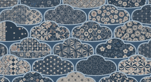 Seamless repeating pattern featuring stylized clouds filled with diverse traditional Japanese motifs and floral designs in indigo blue tones