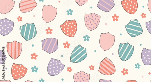 Pastel pink, mint green, and lavender shields create a whimsical seamless pattern perfect for children's fashion or digital background paper