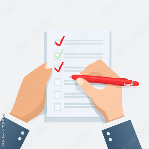 Close-up of a hand with a red pen editing a document, highlighting corrections on a sheet of paper against a neutral background.