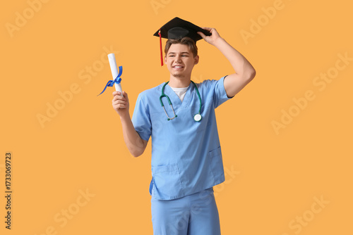Happy male medical graduate...
