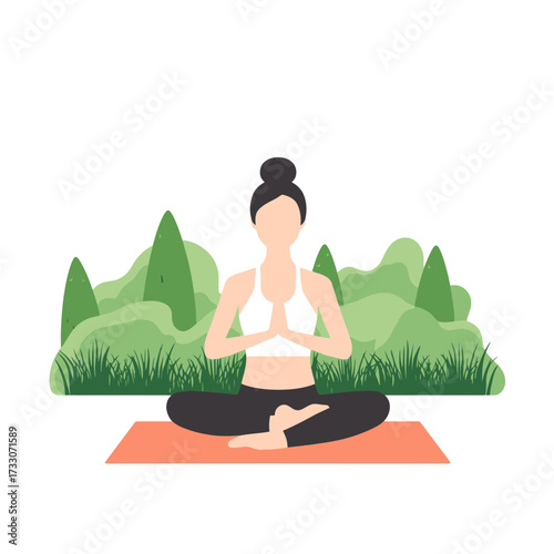 Woman in lotus position meditating on a yoga mat in a park.