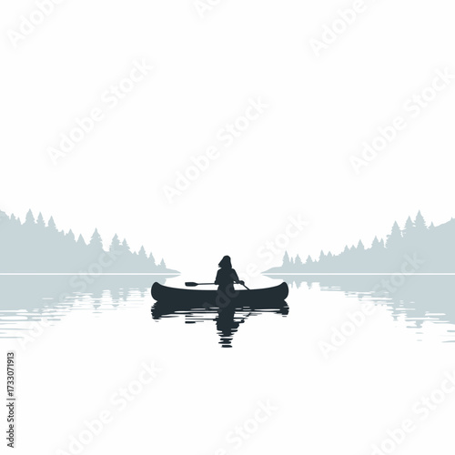 Silhouette of a person canoeing on a calm lake surrounded by trees.