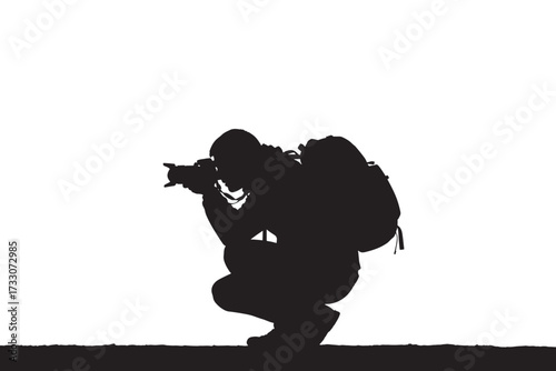A silhouette of a photographer crouches low, capturing a moment with their camera, their form a dark contrast against the white backdrop isolated on white background vector illustration