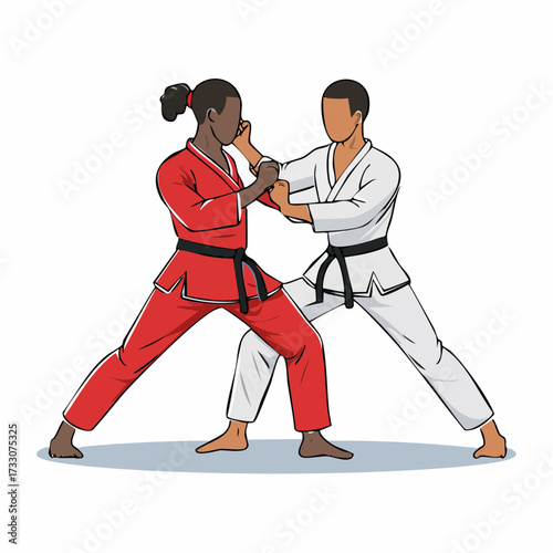 Two male martial artists sparring in a dojo, demonstrating self-defense techniques with focus and determination.