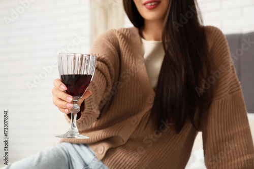 Woman with glass of red win...