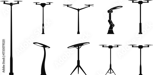Drone silhouettes, robotic arms, futuristic technology, quadcopter design, industrial automation, aerial robotics, innovation concept, unmanned aircraft, modern engineering, artificial intelligence