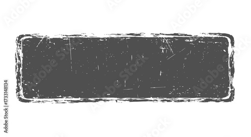 Distressed Rectangular Stamp with Rough Edges and Textured Surface.