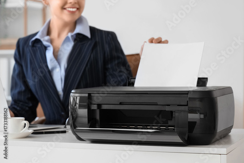 Young businesswoman with pr...