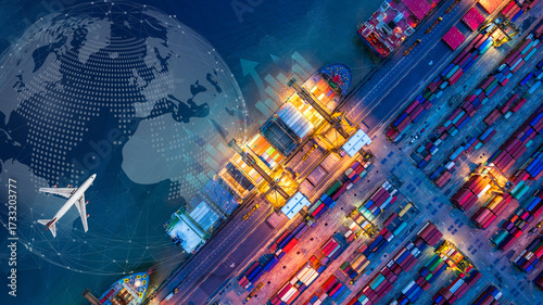 Aerial view and top view cargo plane flying above ship port coverage world map import-export business and logistics international goods. Shipping cargo to harbor by crane