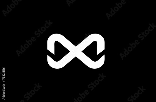 Abstract white infinity symbol design on a sleek black background, representing endless, limitless, and infinite possibilities, continuity, and timelessness.
