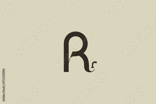 Elegant stylized letter R monogram design. Minimalist sophisticated typographic initial R logo concept on a neutral background.