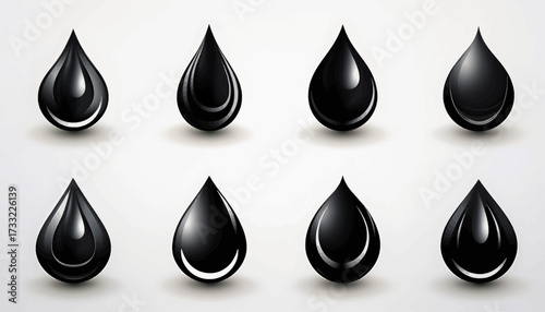 A set of eight realistic, glossy black liquid droplets, representing oil or ink, with shiny highlights and shadows on a light background.