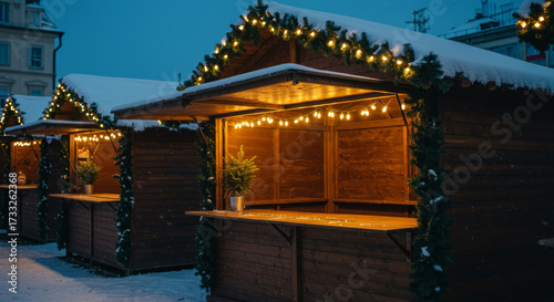 Cozy Christmas market stalls glowing with warm lights on a snowy evening, inviting holiday shoppers, creating festive magic and winter wonderland charm