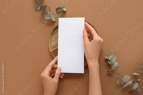 Female hands with blank car...