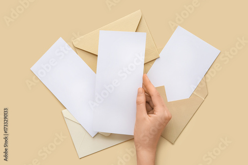 Female hand with blank card...