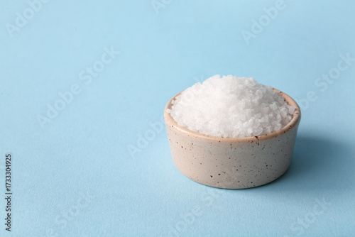 Ceramic bowl of sea salt on...