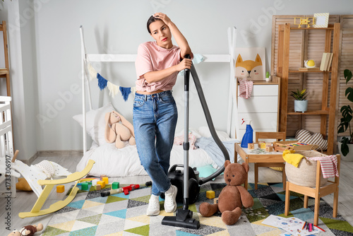 Tired mother with scattered...