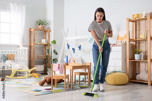 Tired mother with scattered...