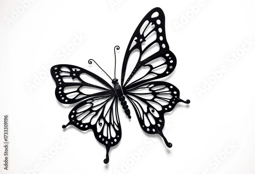 Intricate black metal butterfly silhouette against white background, card, craft