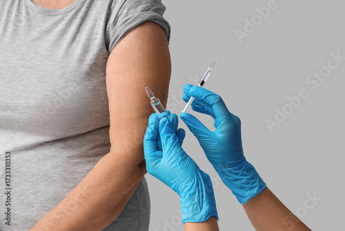 Senior woman and doctor's h...