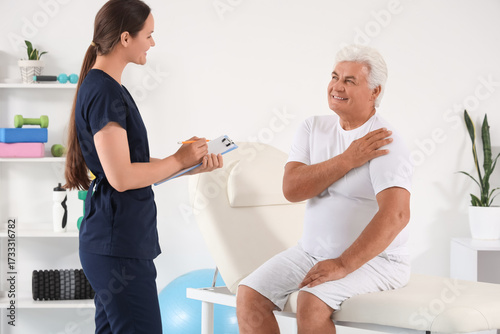 Senior man with shoulder pa...