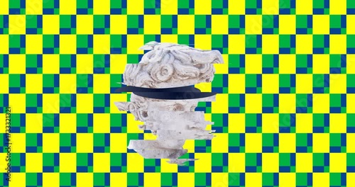 Animation of head sculpture moving on yellow square patterned background