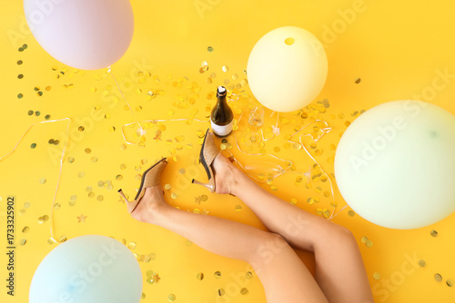 Legs of woman with balloons...
