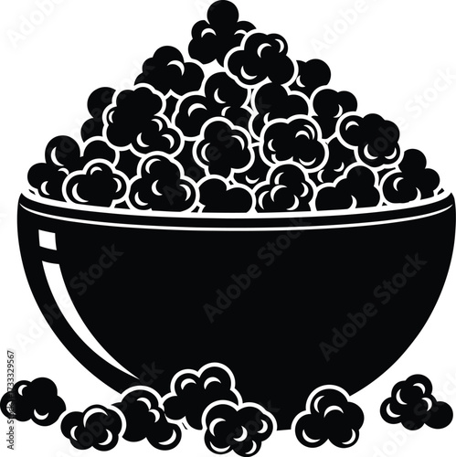 Overflowing bowl of popcorn, snack time, movie night