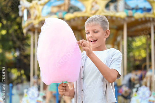 Teen boy with cotton candy ...