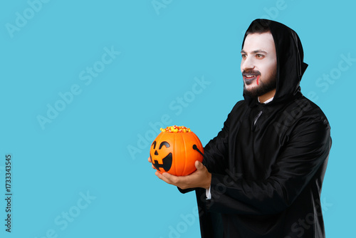 Young man dressed as vampir...