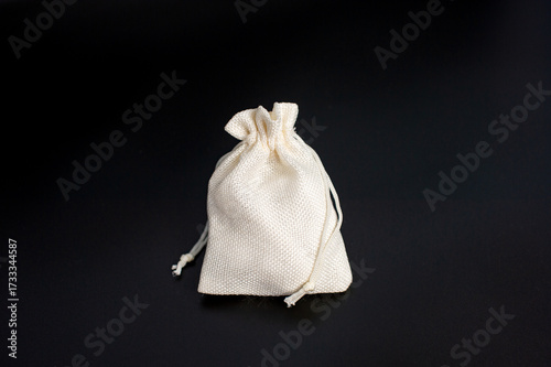 Wallpaper Mural Small canvas drawstring bag on black background Torontodigital.ca