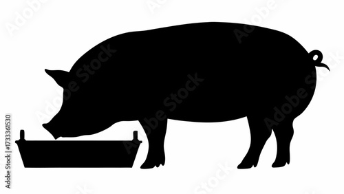 Silhouette of a pig eating from a trough, capturing farm life and agriculture themes.