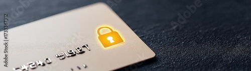 Online Banking Security and Data Protection, A close-up of a credit card featuring a padlock symbol, signifying security and protection.