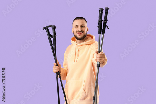 Smiling young man with walk...