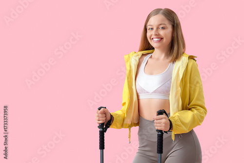 Sporty young woman with wal...