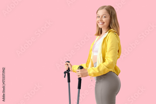 Sporty young woman with wal...