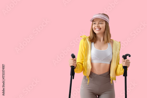 Sporty young woman with wal...
