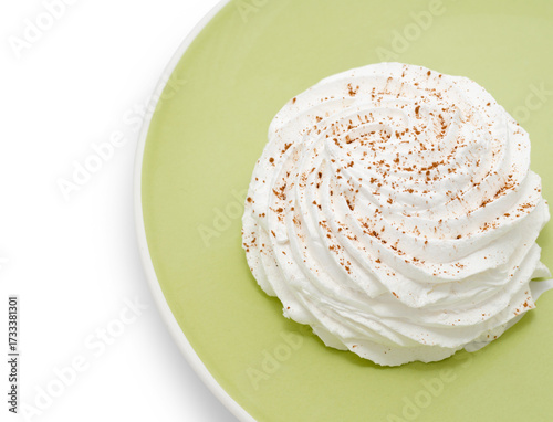 meringue on light green plate